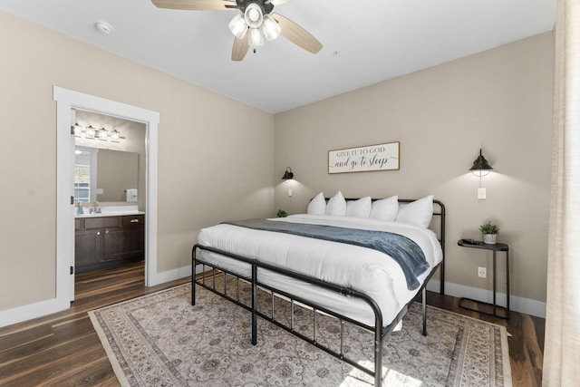 440 Lake Front Dr, Branson, MO 65616 - bedroom with a sink, dark wood-style flooring, baseboards, ensuite bath, and a ceiling fan