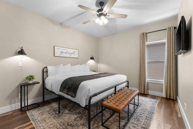 440 Lake Front Dr, Branson, MO 65616 - bedroom with wood finished floors, baseboards, and ceiling fan