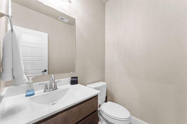 440 Lake Front Dr, Branson, MO 65616 - half bathroom featuring vanity and toilet