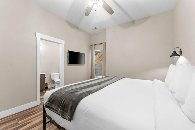 440 Lake Front Dr, Branson, MO 65616 - bedroom with wood finished floors, baseboards, ensuite bathroom, and a ceiling fan