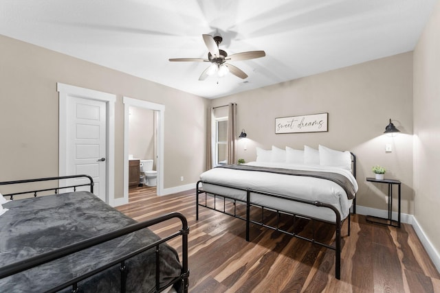 440 Lake Front Dr, Branson, MO 65616 - bedroom featuring baseboards, wood finished floors, a ceiling fan, and connected bathroom