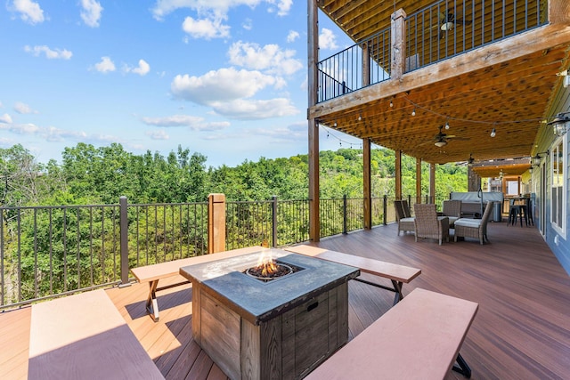440 Lake Front Dr, Branson, MO 65616 - deck with a fire pit and a ceiling fan