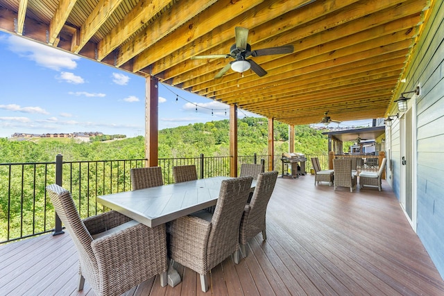 440 Lake Front Dr, Branson, MO 65616 - wooden terrace with outdoor dining area, a ceiling fan, and grilling area