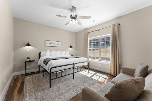 440 Lake Front Dr, Branson, MO 65616 - bedroom featuring baseboards, wood finished floors, and ceiling fan