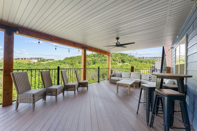 440 Lake Front Dr, Branson, MO 65616 - wooden terrace with an outdoor hangout area and a ceiling fan