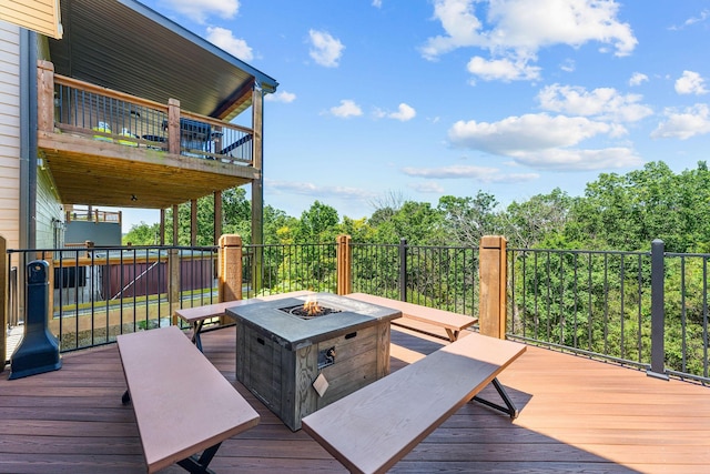 440 Lake Front Dr, Branson, MO 65616 - wooden terrace featuring a fire pit