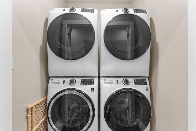 440 Lake Front Dr, Branson, MO 65616 - washroom with stacked washing machine and dryer
