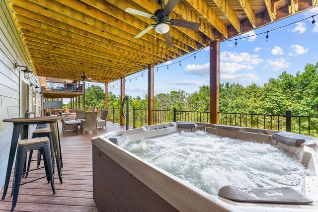 440 Lake Front Dr, Branson, MO 65616 - wooden terrace featuring a hot tub and a ceiling fan