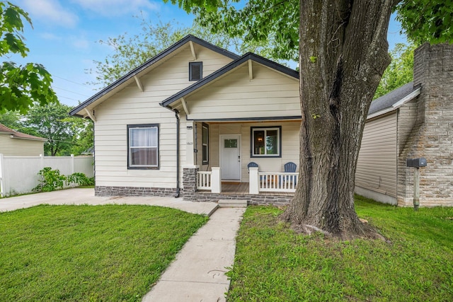 1609 N Lyon Ave, Springfield, MO 65803 - view of front facade featuring a porch