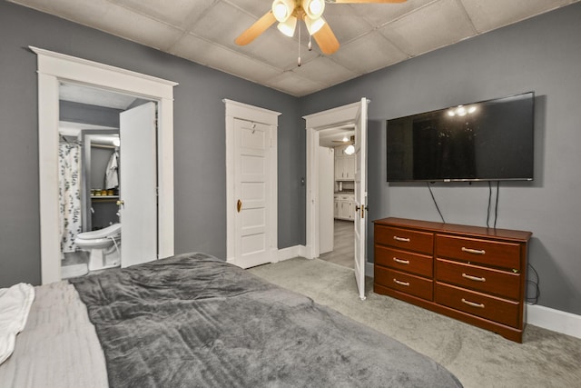 2052 N Grant Ave, Springfield, MO 65803 - bedroom featuring carpet, a paneled ceiling, ensuite bathroom, and baseboards