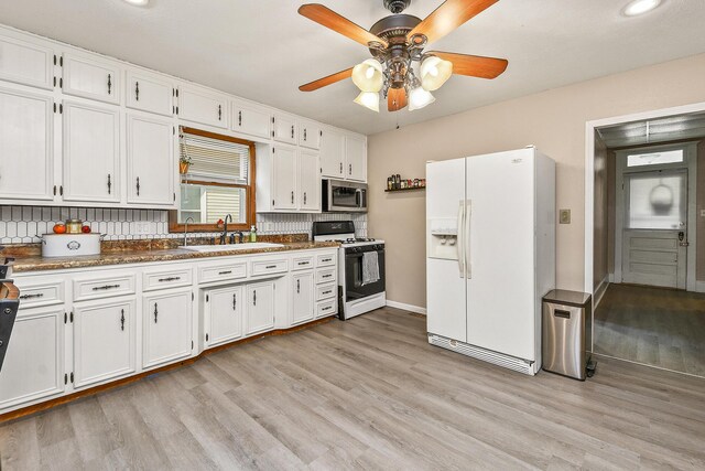 2052 N Grant Ave, Springfield, MO 65803 - kitchen with white appliances, a sink, white cabinetry, and ceiling fan