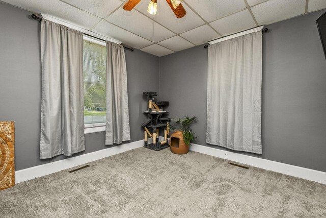 2052 N Grant Ave, Springfield, MO 65803 - miscellaneous room featuring a drop ceiling, carpet floors, ceiling fan, and baseboards
