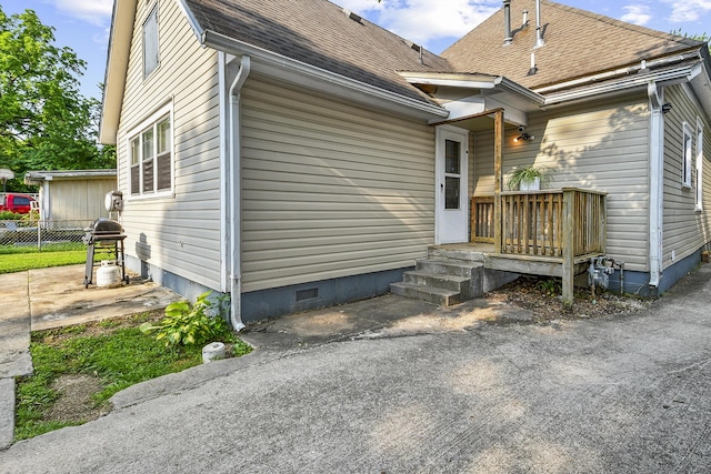 2052 N Grant Ave, Springfield, MO 65803 - back of house with crawl space and a shingled roof