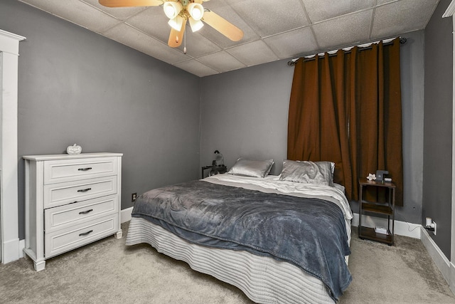 2052 N Grant Ave, Springfield, MO 65803 - carpeted bedroom featuring a drop ceiling, baseboards, and a ceiling fan
