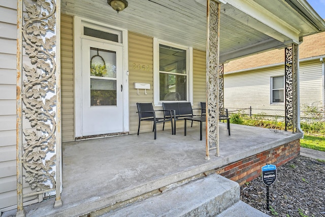 2052 N Grant Ave, Springfield, MO 65803 - view of exterior entry with a porch