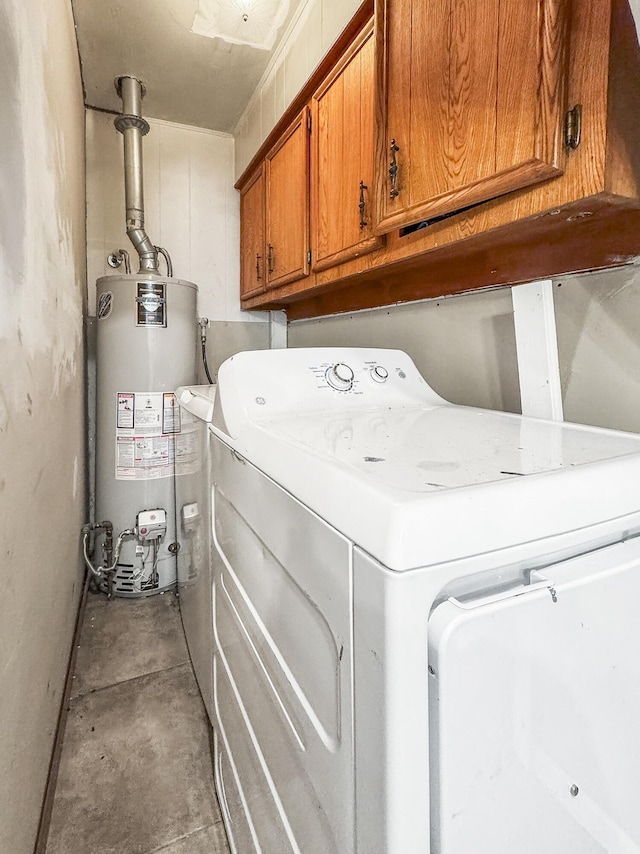 2052 N Grant Ave, Springfield, MO 65803 - laundry room featuring water heater, cabinet space, and washer / clothes dryer