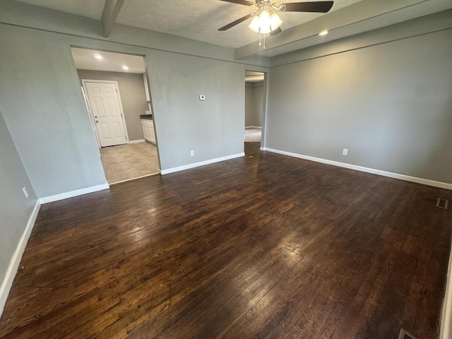2152 E Cairo St, Springfield, MO 65802 - unfurnished room with dark wood-style flooring, ceiling fan, baseboards, and recessed lighting
