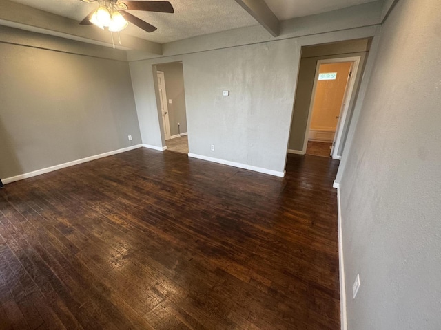 2152 E Cairo St, Springfield, MO 65802 - empty room featuring a ceiling fan, dark wood-style floors, and baseboards