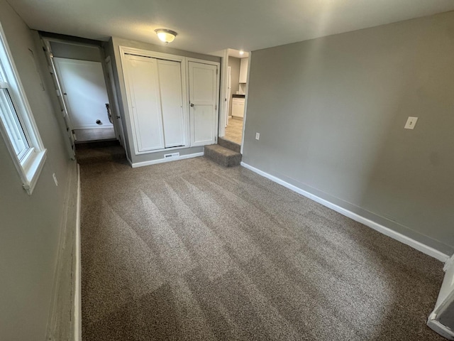 2152 E Cairo St, Springfield, MO 65802 - unfurnished bedroom with baseboards and carpet