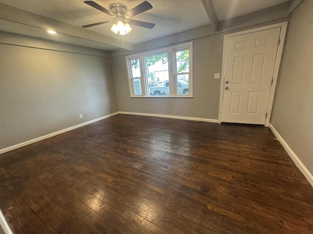 2152 E Cairo St, Springfield, MO 65802 - spare room with ceiling fan, dark wood-style floors, baseboards, and a textured ceiling