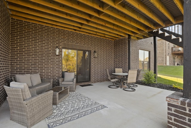 7015 Calabash St, Nixa, MO 65714 - view of patio featuring outdoor dining area and an outdoor living space