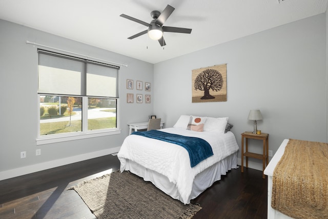 7015 Calabash St, Nixa, MO 65714 - bedroom featuring dark wood finished floors, baseboards, and a ceiling fan