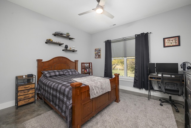 7015 Calabash St, Nixa, MO 65714 - bedroom featuring baseboards, an office area, ceiling fan, and finished concrete flooring