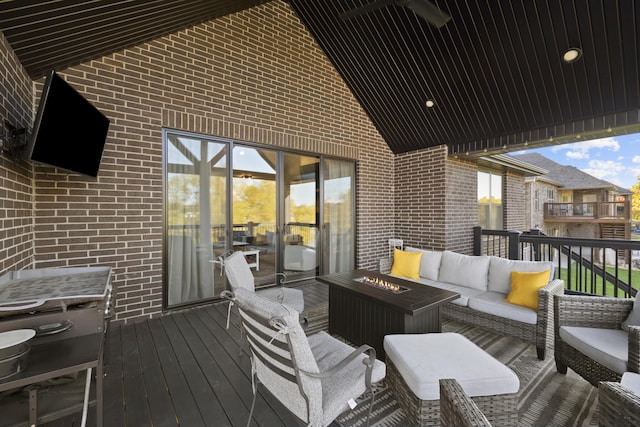 7015 Calabash St, Nixa, MO 65714 - wooden terrace featuring an outdoor living space with a fire pit