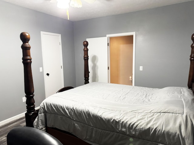 27641 County Road 356, Pittsburg, MO 65724 - bedroom with dark wood-style flooring and baseboards