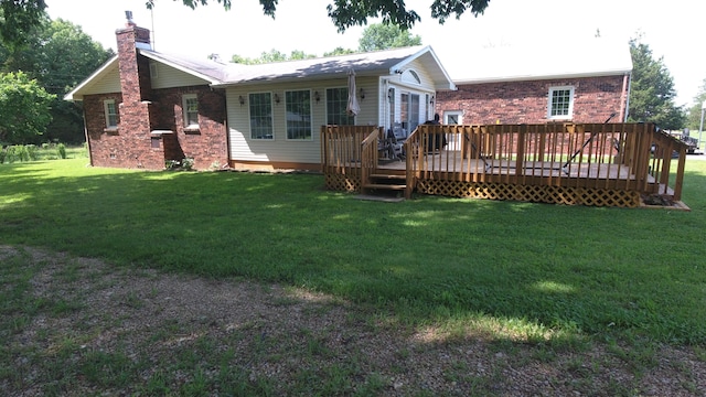 27641 County Road 356, Pittsburg, MO 65724 - back of house with a chimney, brick siding, and a yard
