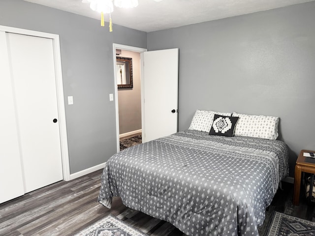 27641 County Road 356, Pittsburg, MO 65724 - bedroom with wood finished floors and baseboards