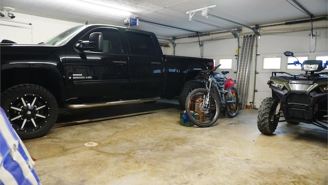4287 Olga Rd, Fordland, MO 65652 - garage featuring a garage door opener