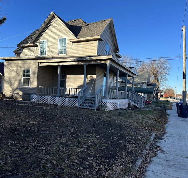 512 W Daugherty St, Webb City, MO 64870 - view of front facade featuring covered porch