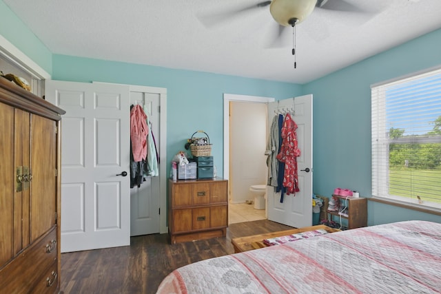 1142 Rte F, Anderson, MO 64831 - bedroom with wood finished floors, ensuite bathroom, and a ceiling fan
