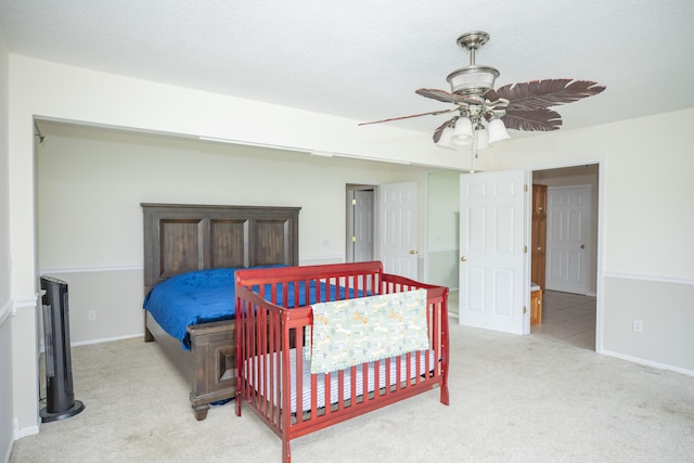 1603 W Northwood St, Bolivar, MO 65613 - carpeted bedroom with a ceiling fan and baseboards