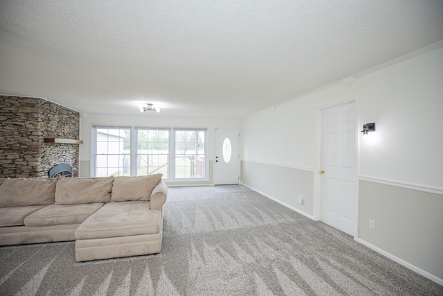 1603 W Northwood St, Bolivar, MO 65613 - carpeted living room featuring a textured ceiling and baseboards