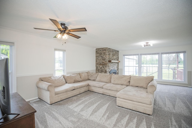 1603 W Northwood St, Bolivar, MO 65613 - living room with carpet flooring, plenty of natural light, ceiling fan, and a textured ceiling