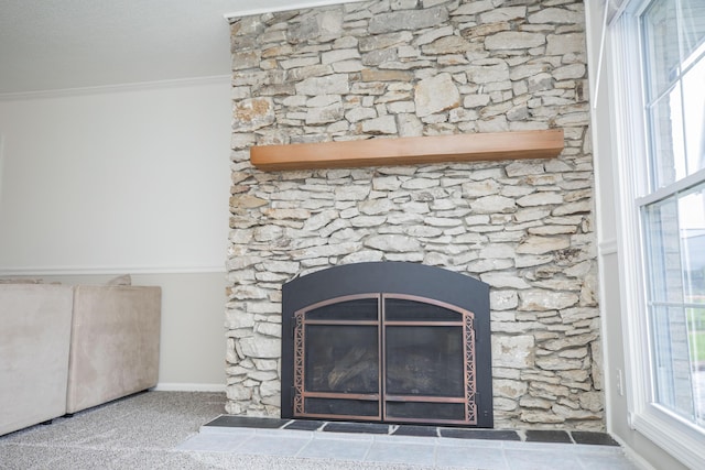 1603 W Northwood St, Bolivar, MO 65613 - detailed view of crown molding, a fireplace, and baseboards