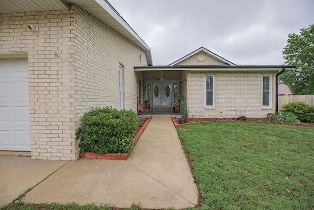 1603 W Northwood St, Bolivar, MO 65613 - view of front of home featuring brick siding and a garage