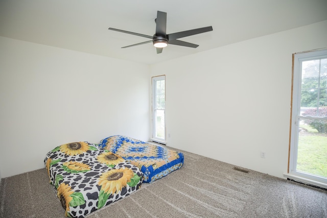 1603 W Northwood St, Bolivar, MO 65613 - carpeted bedroom featuring ceiling fan