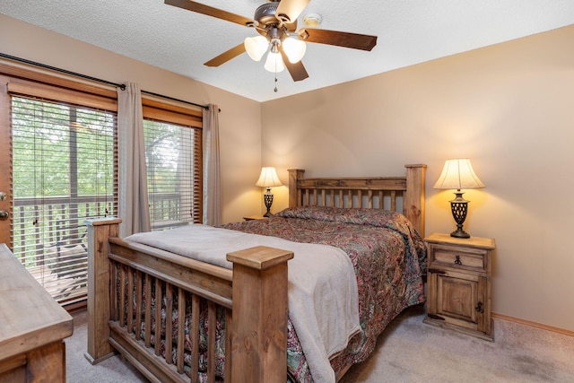 550 Notch Ln Unit 2, Reeds Spring, MO 65737 - bedroom featuring light colored carpet, ceiling fan, and baseboards