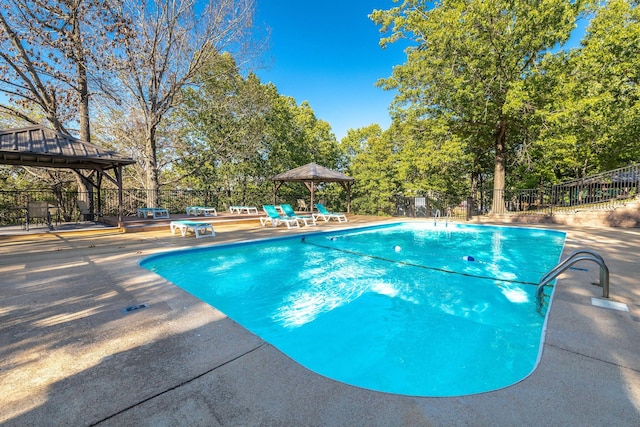 550 Notch Ln Unit 2, Reeds Spring, MO 65737 - view of pool with a gazebo, a patio, and view of scattered trees