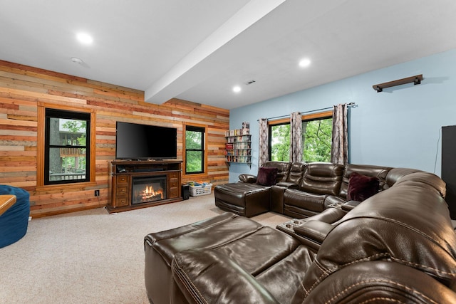 25158 Autumn View Dr, Shell Knob, MO 65747 - carpeted living room featuring wooden walls, beamed ceiling, a glass covered fireplace, and recessed lighting