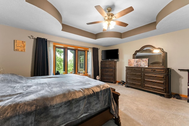 25158 Autumn View Dr, Shell Knob, MO 65747 - bedroom featuring carpet flooring, a ceiling fan, a raised ceiling, and baseboards