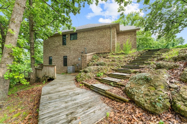 25158 Autumn View Dr, Shell Knob, MO 65747 - rear view of property featuring stairs, brick siding, a wooden deck, and central air condition unit