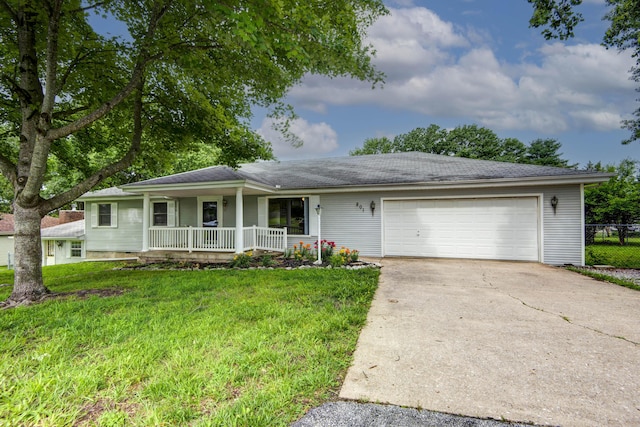 801 N 11th Ave, Ozark, MO 65721 - view of front of home featuring a porch, a garage, and concrete driveway