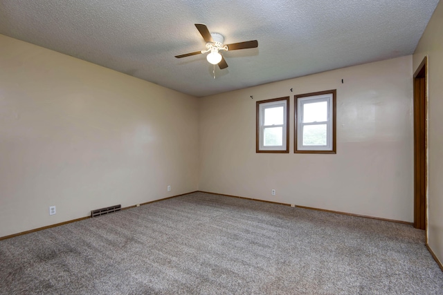 801 N 11th Ave, Ozark, MO 65721 - carpeted empty room featuring ceiling fan, a textured ceiling, and baseboards