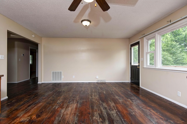 801 N 11th Ave, Ozark, MO 65721 - spare room featuring wood-type flooring, a textured ceiling, ceiling fan, and baseboards