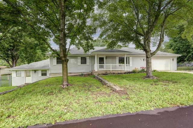 801 N 11th Ave, Ozark, MO 65721 - view of front of home with a porch, an attached garage, and concrete driveway