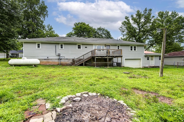 801 N 11th Ave, Ozark, MO 65721 - back of property with a deck, an attached garage, and stairway